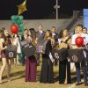 Homecoming Queen candidates Friday night awaiting the announcement of the winners.